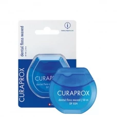 Зубна нитка Curaprox DF 834 вощена з ароматом м'яти (50 м.)