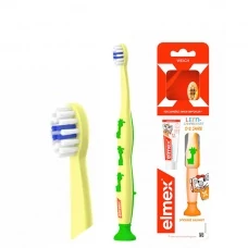 Мануальна зубна щітка Elmex (для дітей 0-2 років) + міні-зубна паста (12 мл.) ЄС