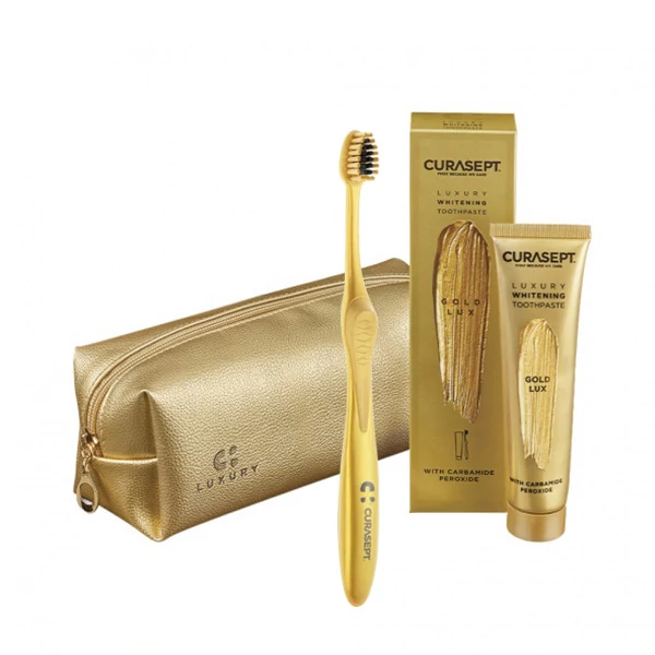 Набір Curasept Gold Luxury Whitening (зубна паста 75 мл. + зубна щітка + косметичка) ЄС